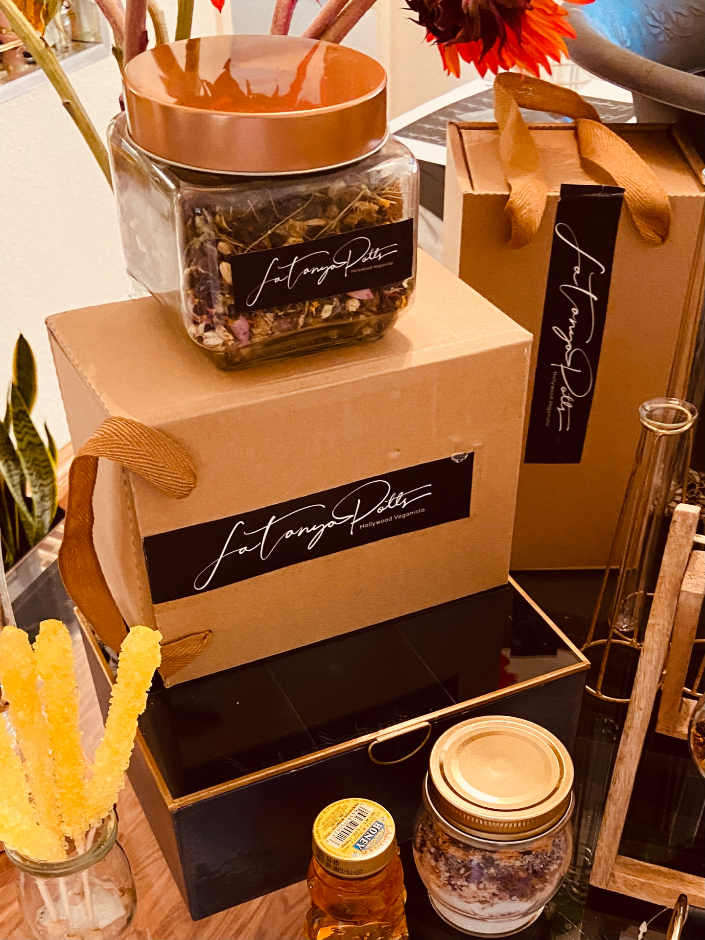 UNBOTHERED branded tea jar and kraft gift boxes